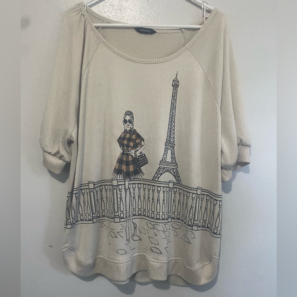 Stylish Beige Blouse with Parisian Graphic